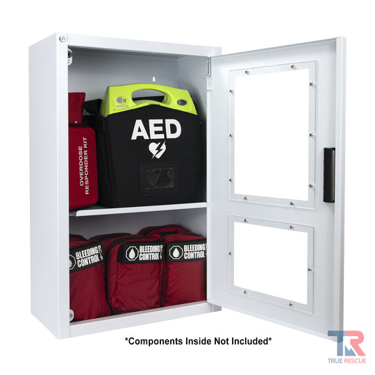 Combination surface mounted metal cabinet showing AED and bleeding control kits inside